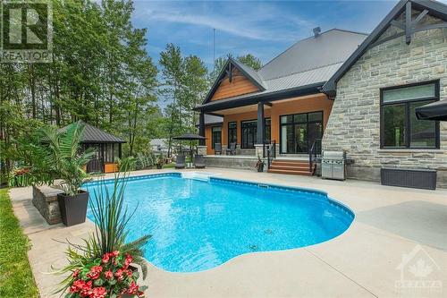 2868 Bouvier Road, Clarence-Rockland, ON - Outdoor With In Ground Pool With Deck Patio Veranda