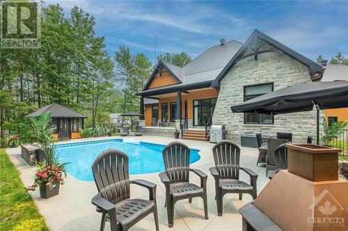 2868 Bouvier Road, Clarence-Rockland, ON - Outdoor With In Ground Pool With Deck Patio Veranda