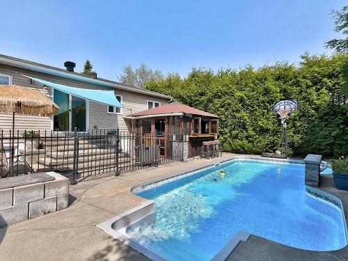 Cour - 17 Rue Des Roitelets, Delson, QC - Outdoor With In Ground Pool With Deck Patio Veranda