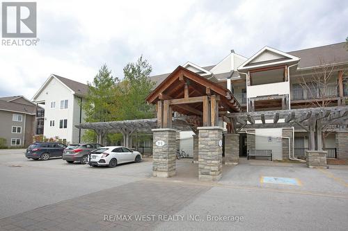 203 - 1 Brandy Lane Drive, Collingwood, ON - Outdoor With Facade