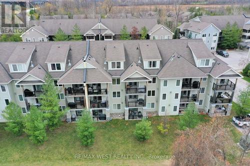 203 - 1 Brandy Lane Drive, Collingwood, ON - Outdoor With Facade