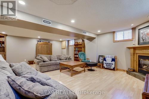 53 Georgina Dr, Ajax, ON - Indoor Photo Showing Basement With Fireplace