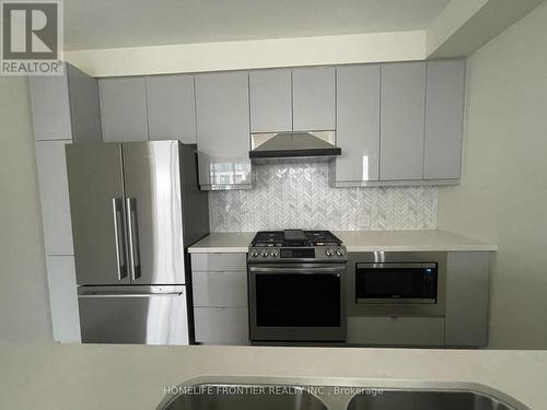 #Ph 2501 -50 Thomas Riley Rd, Toronto, ON - Indoor Photo Showing Kitchen With Stainless Steel Kitchen With Double Sink