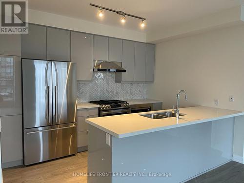 #Ph 2501 -50 Thomas Riley Rd, Toronto, ON - Indoor Photo Showing Kitchen With Stainless Steel Kitchen With Double Sink