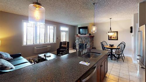 412 A - 400 Bighorn Boulevard, Radium Hot Springs, BC - Indoor With Fireplace