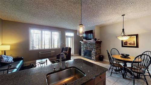 412 A - 400 Bighorn Boulevard, Radium Hot Springs, BC - Indoor With Fireplace