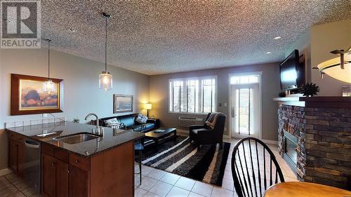 400 Bighorn Boulevard Unit# 412 A, Radium Hot Springs, BC - Indoor With Fireplace