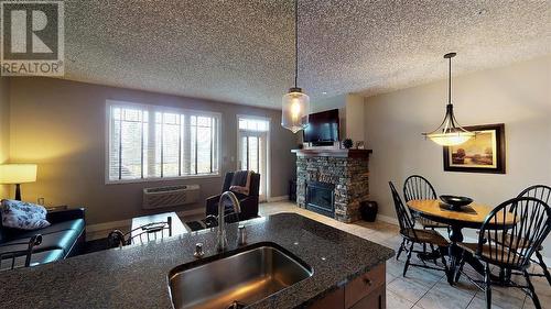 400 Bighorn Boulevard Unit# 412 A, Radium Hot Springs, BC - Indoor With Fireplace