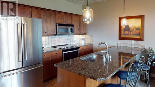 400 Bighorn Boulevard Unit# 412 A, Radium Hot Springs, BC - Indoor Photo Showing Kitchen With Stainless Steel Kitchen With Upgraded Kitchen