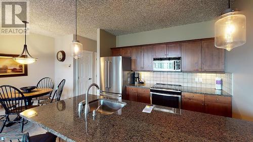 400 Bighorn Boulevard Unit# 412 A, Radium Hot Springs, BC - Indoor Photo Showing Kitchen With Stainless Steel Kitchen