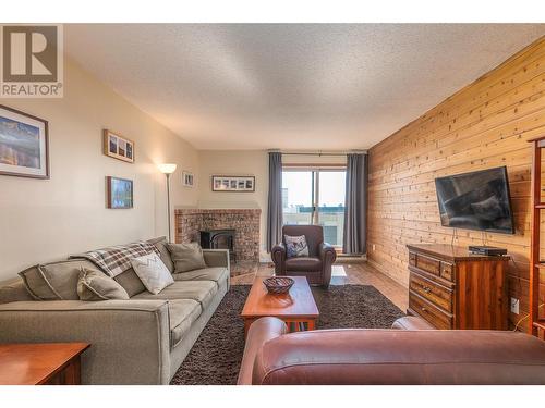 6430 Whiskey Jack Road Unit# 303, Big White, BC - Indoor Photo Showing Living Room With Fireplace