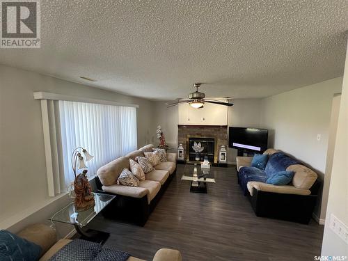207 Steiger Crescent, Saskatoon, SK - Indoor Photo Showing Living Room With Fireplace