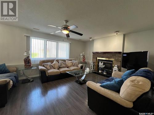 207 Steiger Crescent, Saskatoon, SK - Indoor Photo Showing Living Room With Fireplace