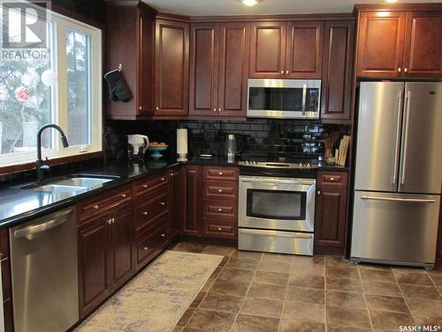 518 Canawindra Cove, Nipawin, SK - Indoor Photo Showing Kitchen With Double Sink