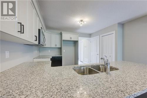 117 Stephenson Way, Palmerston, ON - Indoor Photo Showing Kitchen With Double Sink