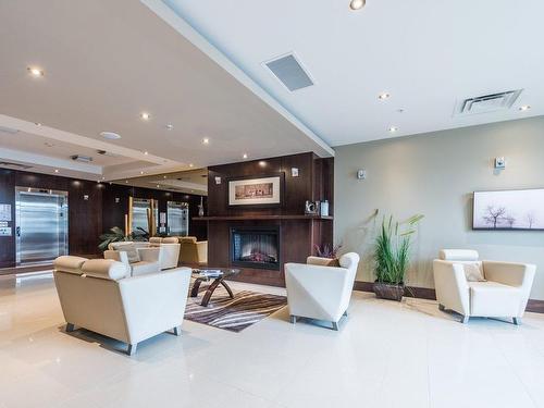 Autre - 801-4500 Ch. Des Cageux, Laval (Chomedey), QC - Indoor With Fireplace