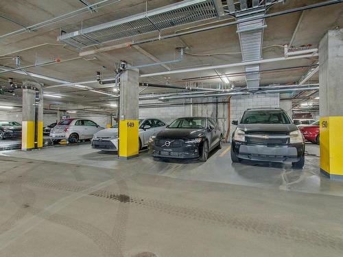 Garage - 801-4500 Ch. Des Cageux, Laval (Chomedey), QC - Indoor Photo Showing Garage