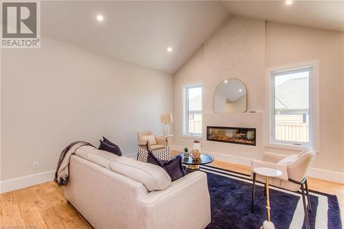 19 Carriage Crossing, Drayton, ON - Indoor Photo Showing Living Room With Fireplace