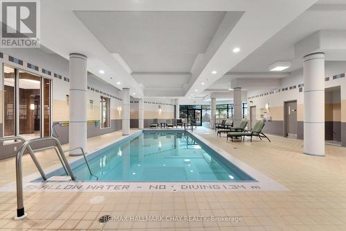#711 -33 Ellen St, Barrie, ON - Indoor Photo Showing Other Room With In Ground Pool