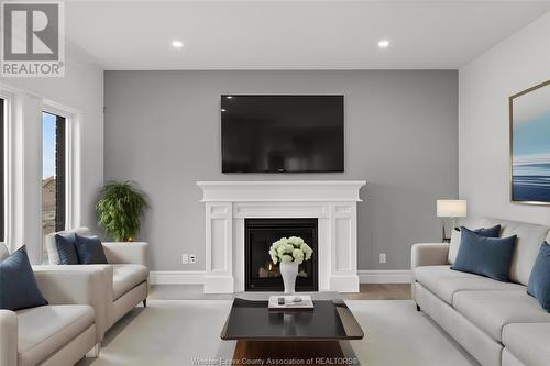 519 Veneto Street, Lakeshore, ON - Indoor Photo Showing Living Room With Fireplace