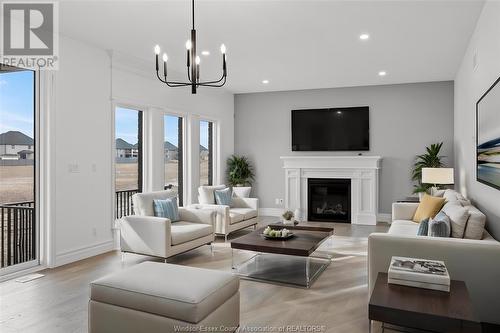 519 Veneto Street, Lakeshore, ON - Indoor Photo Showing Living Room With Fireplace
