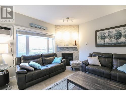 104-15 Solana Key Crt Court, Osoyoos, BC - Indoor Photo Showing Living Room With Fireplace