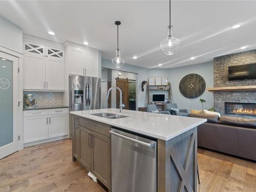 225 Kicking Horse Place, Vernon, BC - Indoor Photo Showing Kitchen With Fireplace With Double Sink With Upgraded Kitchen