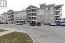 #211 -1045 Nadalin Hts, Milton, ON  - Outdoor With Balcony With Facade 