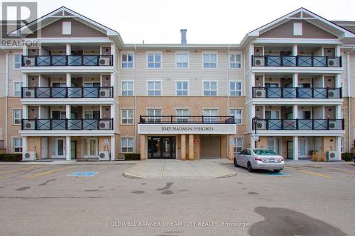 #211 -1045 Nadalin Hts, Milton, ON - Outdoor With Balcony With Facade