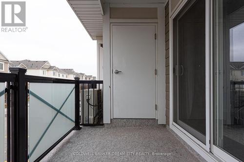 #211 -1045 Nadalin Hts, Milton, ON - Outdoor With Balcony With Exterior