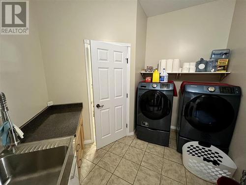 2 6550 Old Alaska Highway, Fort Nelson, BC - Indoor Photo Showing Laundry Room