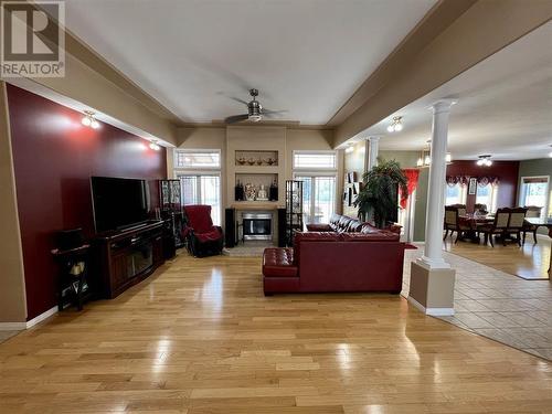 2 6550 Old Alaska Highway, Fort Nelson, BC - Indoor Photo Showing Living Room With Fireplace