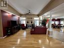 2 6550 Old Alaska Highway, Fort Nelson, BC  - Indoor Photo Showing Living Room With Fireplace 