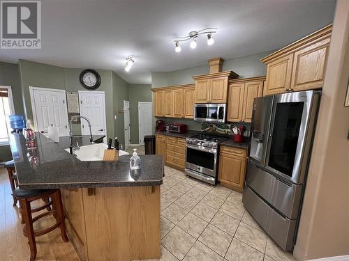 2 6550 Old Alaska Highway, Fort Nelson, BC - Indoor Photo Showing Kitchen