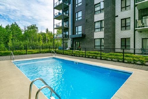 Pool - 302-415 Rue Du Petit-Coliade, La Prairie, QC - Outdoor With In Ground Pool