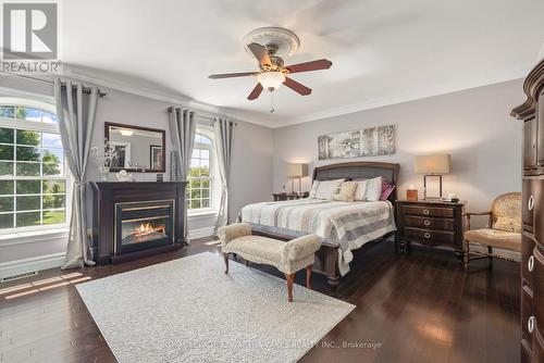 542 Lily Lake Road, Smith-Ennismore-Lakefield, ON - Indoor Photo Showing Bedroom With Fireplace