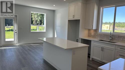 7031 Hillu Road, Prince George, BC - Indoor Photo Showing Kitchen With Double Sink