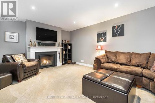 41 Heatherwood Dr, Springwater, ON - Indoor Photo Showing Living Room With Fireplace