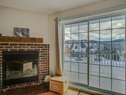 View - 729-A Rue Principale, Saint-Sauveur, QC - Indoor With Fireplace