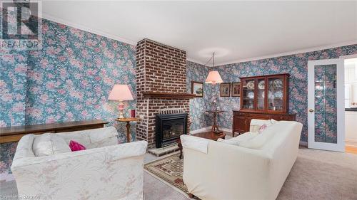 188 Old Beach Drive, Georgian Bluffs, ON - Indoor Photo Showing Living Room With Fireplace