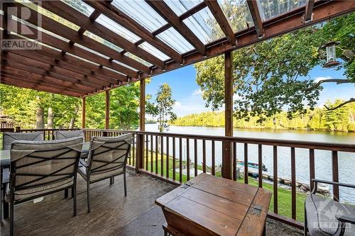 3577 Calabogie Road, Greater Madawaska, ON - Outdoor With Body Of Water With Balcony With Deck Patio Veranda With Exterior