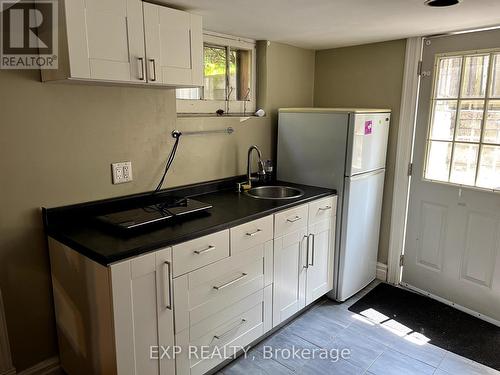 125 Haddon Avenue S, Hamilton, ON - Indoor Photo Showing Kitchen With Double Sink