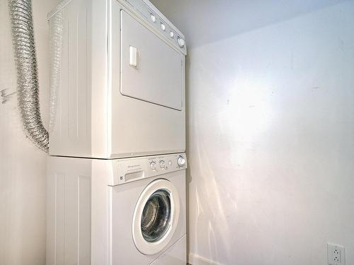 Salle de lavage - 1603-350 Boul. De Maisonneuve O., Montréal (Ville-Marie), QC - Indoor Photo Showing Laundry Room
