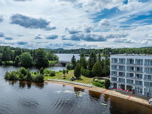 Aerial photo - 112-39 Ch. Fridolin-Simard, Estérel, QC - Outdoor With Body Of Water With View