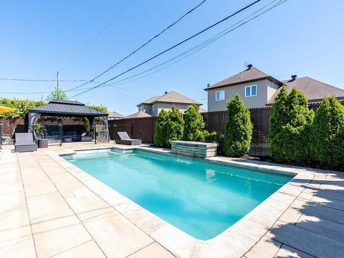 Piscine - 141 Rue Des Cascades, Vaudreuil-Dorion, QC - Outdoor With In Ground Pool With Backyard