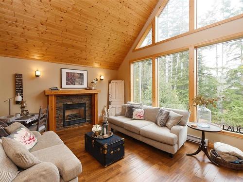 B-3208 Otter Point Rd, Sooke, BC - Indoor Photo Showing Living Room With Fireplace