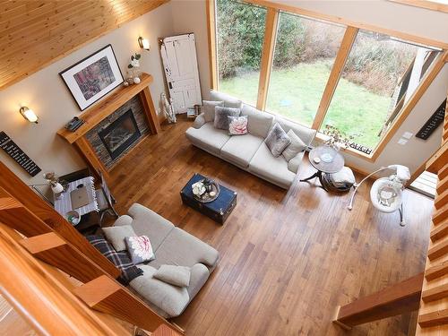 B-3208 Otter Point Rd, Sooke, BC - Indoor Photo Showing Living Room With Fireplace