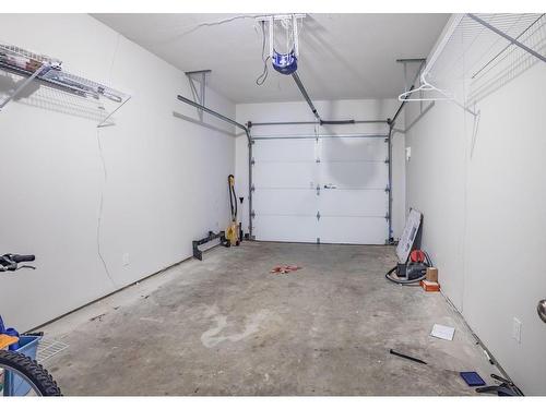 101-5186 Dunster Rd, Nanaimo, BC - Indoor Photo Showing Garage