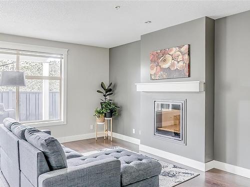 6401 Thyme Pl, Nanaimo, BC - Indoor Photo Showing Living Room With Fireplace