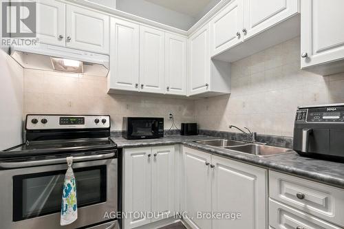 #708 -393 King St W, Toronto, ON - Indoor Photo Showing Kitchen With Double Sink